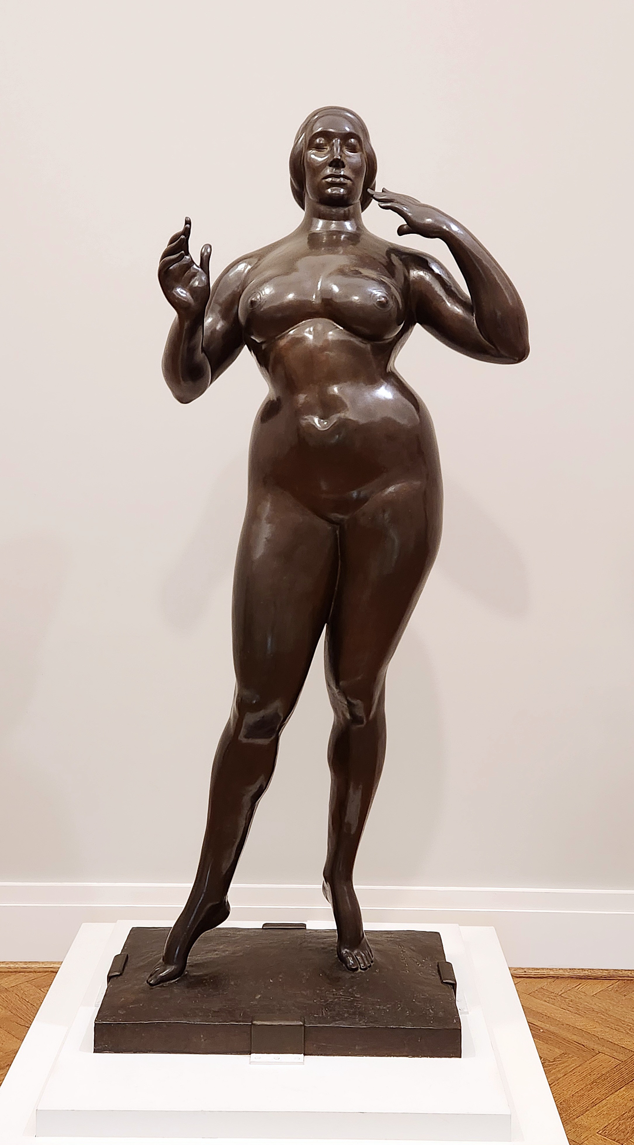 Standing Woman by Gaston Lachaise, a bronze sculpture of a voluptuous nude woman.